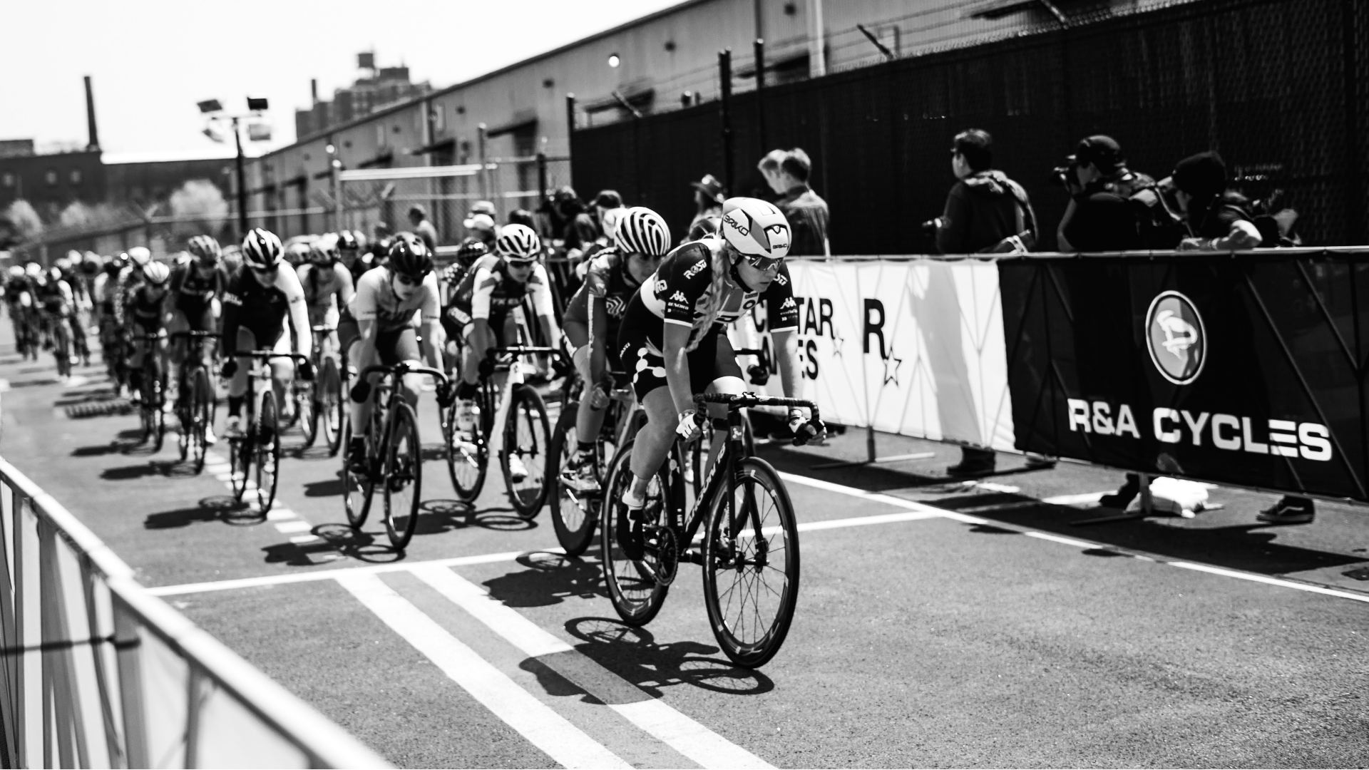 Women's cycling race forced to pause after lead rider catches men's